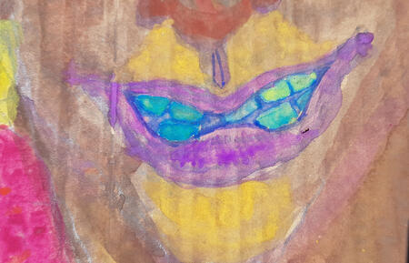 Bottom half of face, smilin mouth with teeth.